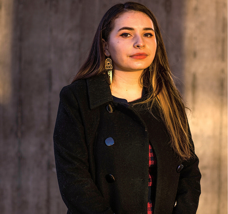 A woman in a black jacket