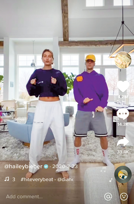 A woman and a man dancing on Tik Tok