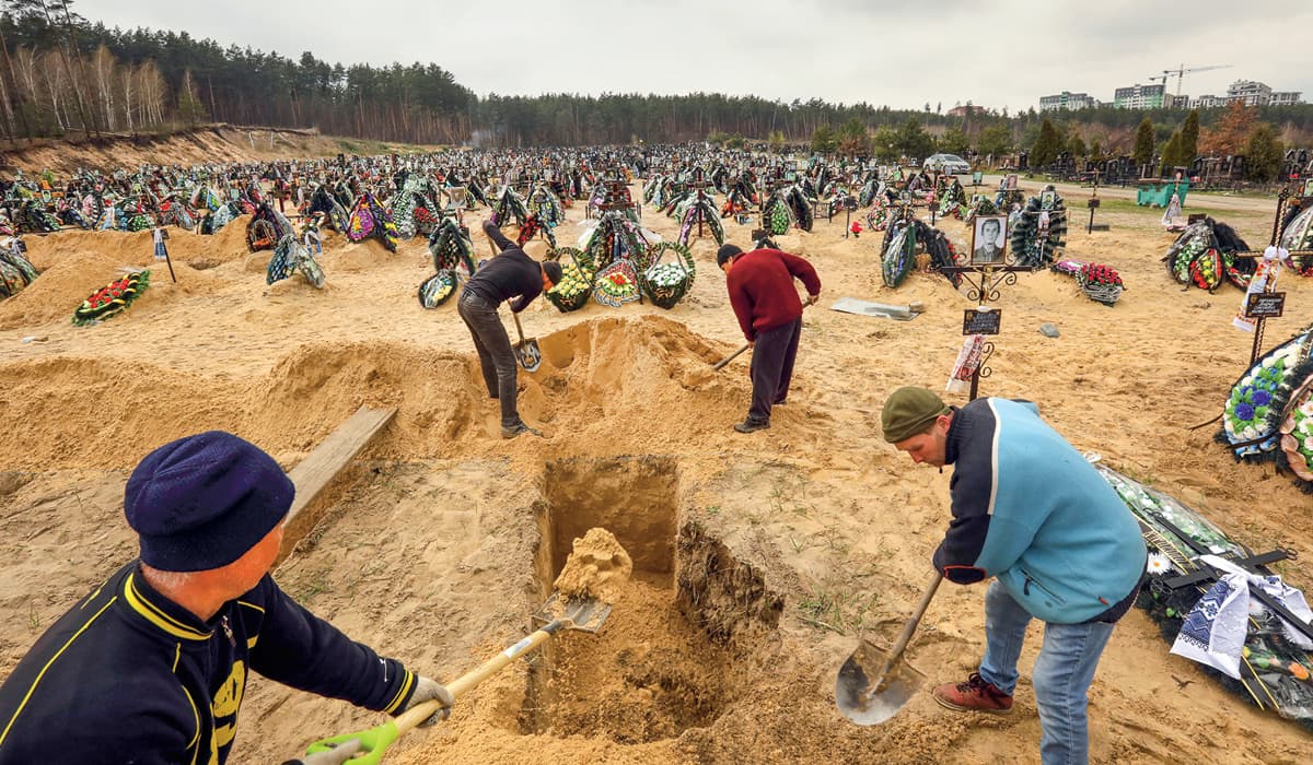 People digging a grave for a burial