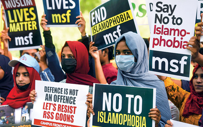 Photo of students protesting against anti-Muslim violence