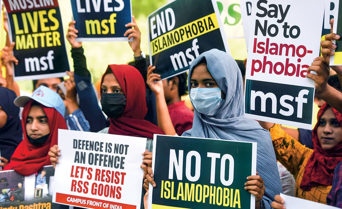Photo of students protesting against anti-Muslim violence