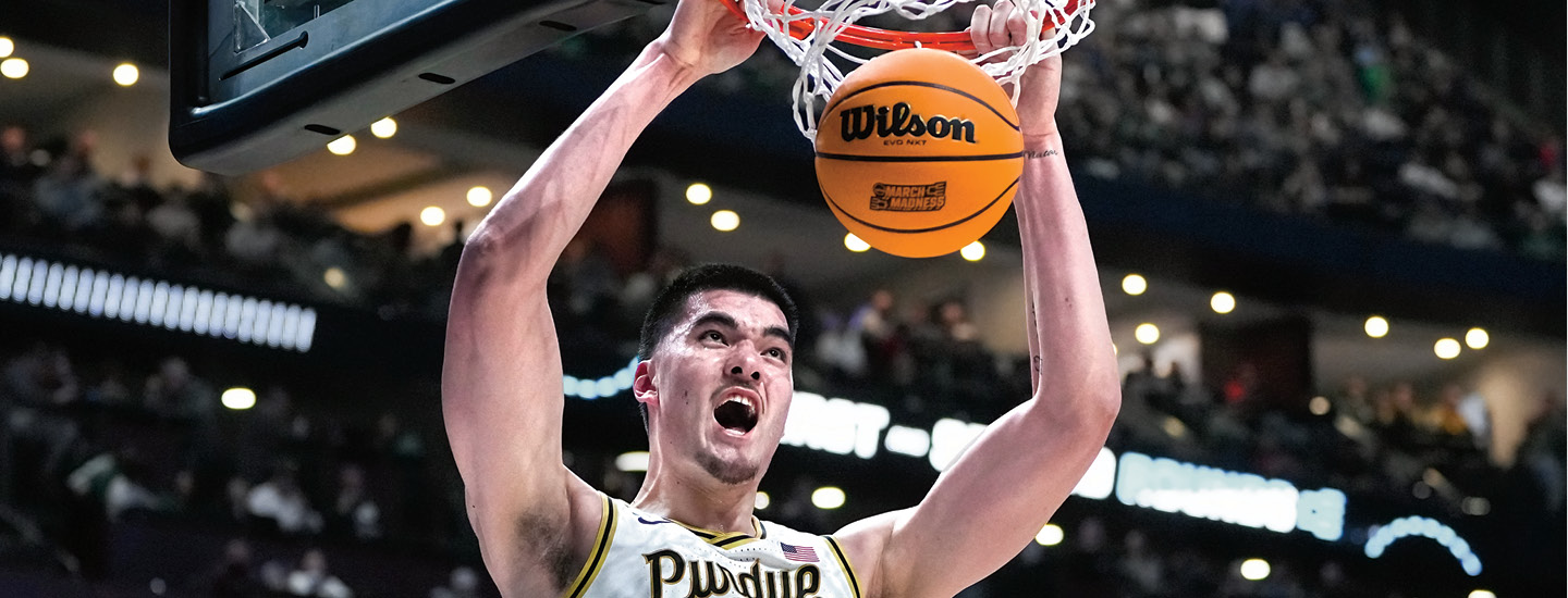 Photo of a Purdue Men&apos;s basketball player dunking the ball