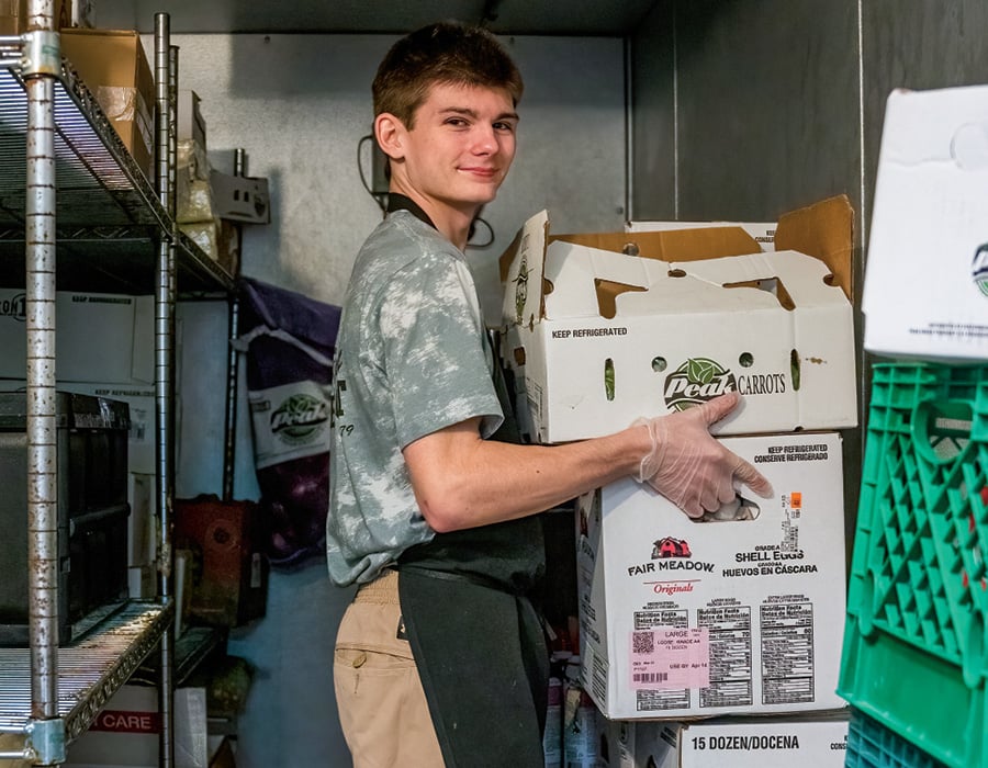Image of a worker storing food
