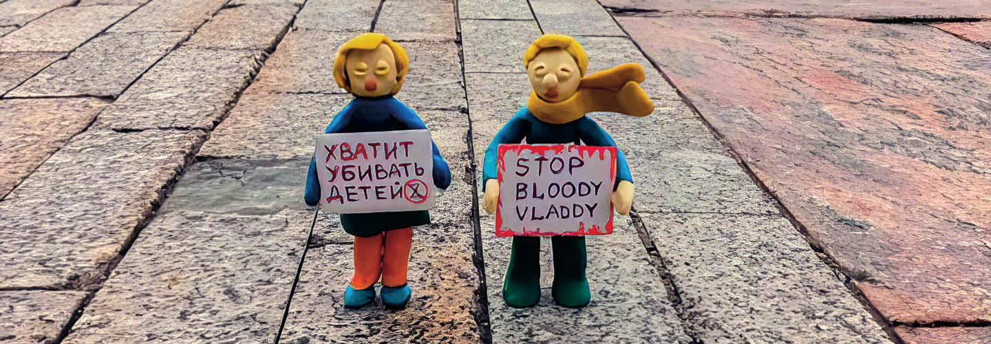Image of clay people holding up signs to "Stop Bloody Vladdy"