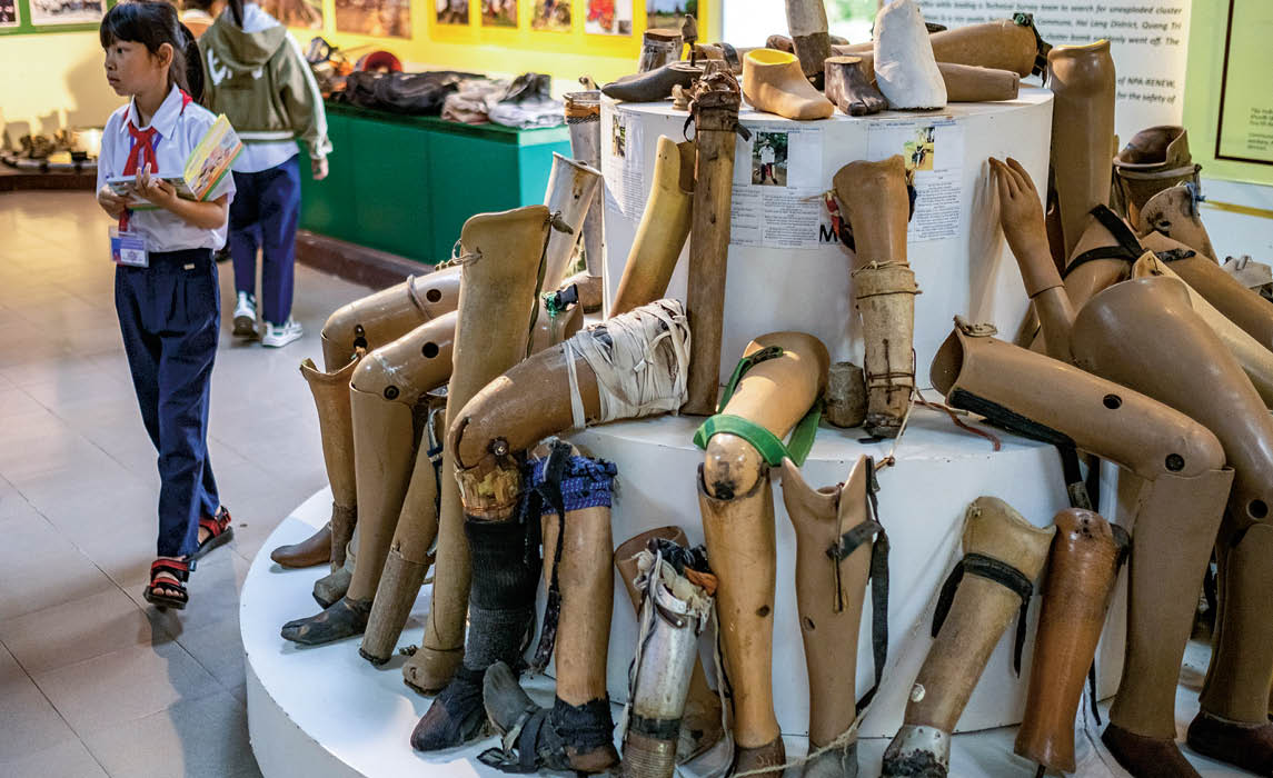 Image of a display of prosthetic legs and arms