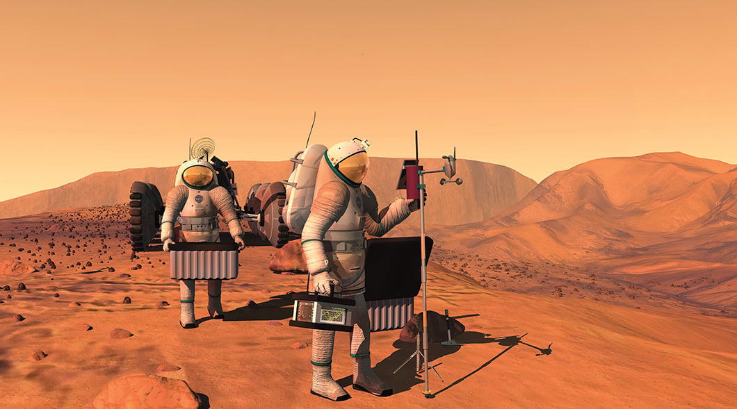 Two NASA astronauts in spacesuits set up scientific equipment on the surface of Mars
