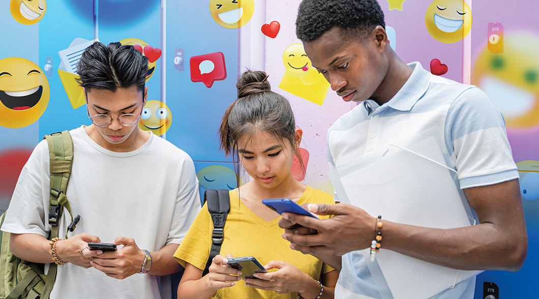 Three students look at their phones surrounded by floating emoji and social media icons