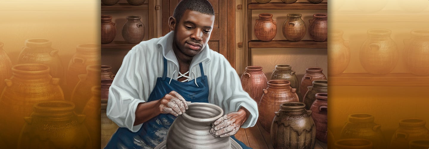 A man in a blue apron shapes a clay jar on a wheel while finished pots line shelves behind him